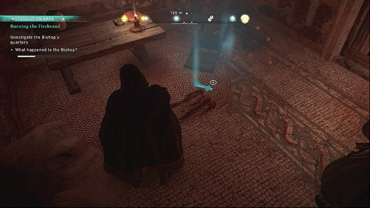 A little further to the left you will notice a bloody object on the ground and traces of blood on the carpet which suggest that some sort of fight has occurred here - Assassins Creed Valhalla: Burning the Firebrand - Jorvik - Assassins Creed Valhalla Guide and Walkthrough