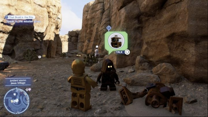 As a Protocol Droid, talk to the NPC and accept the task - LEGO Skywalker Saga: That Droid is the Pits - walkthrough - Tatooine - the desert of Jundland - LEGO Skywalker Saga Guide