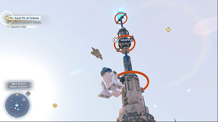 Your task is to reach the top of the tower shown in the picture above - LEGO Skywalker Saga: Niima Outpost - list of all puzzles - Jakku - LEGO Skywalker Saga Guide