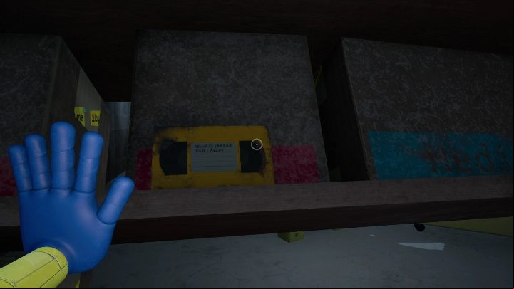 At the bottom you will also find a yellow tape, which is a completely optional collectible - Poppy Playtime: Red Hand - walkthrough - Chapter 1 - Poppy Playtime Guide, Walkthrough