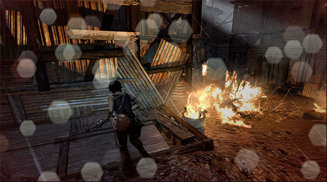 Apart from the machine gun, you should also watch out for the guards stationed on both sides - Regroup with Sam | 17: Into the Fire Walkthrough - 17: Into the Fire | Walkthrough - Tomb Raider Game Guide
